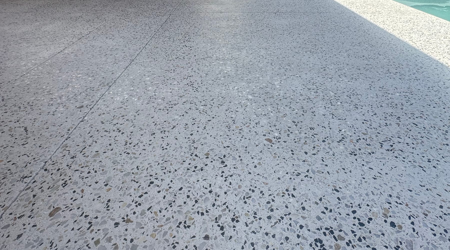 Modern residential driveway shown as architectural inspiration, not an exposed aggregate sample